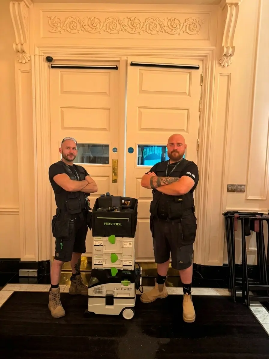 Sentinel Projects directors on site at a completed fire door installation