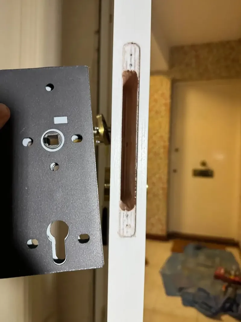 Certified lock case being fitted to an FD30 fire door edge